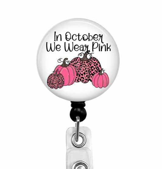 Breast cancer awareness badge reel with pink pumpkins