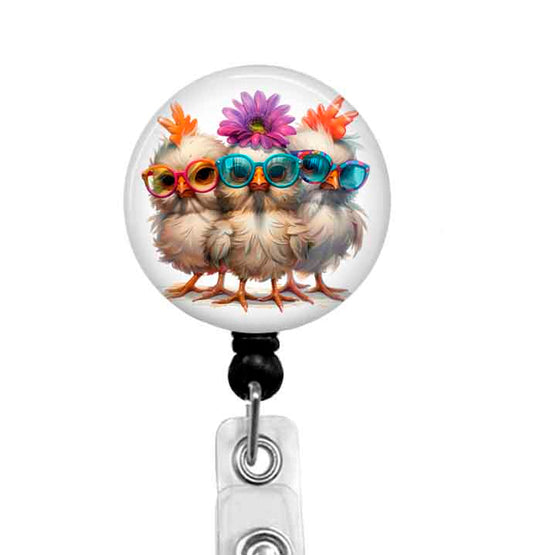 3 baby chicks badge reel